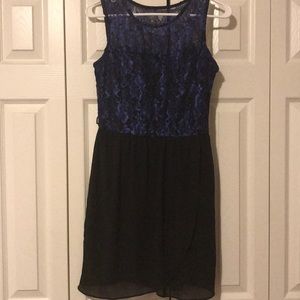 A strapless dress blue on the top, black on bottom